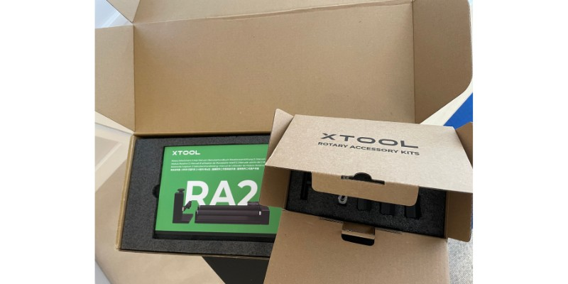 xTool RA2 Pro rotary add-on for laser engraving rounded metal objects like beakers and flasks